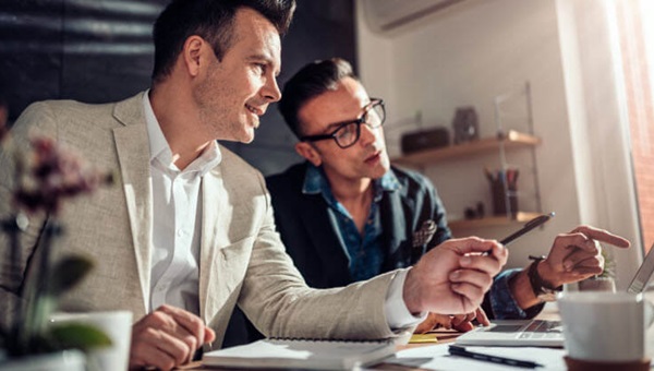 businessmen_discussing_work1173086560 (1)